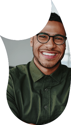 Portrait of young and successful businessman in modern office